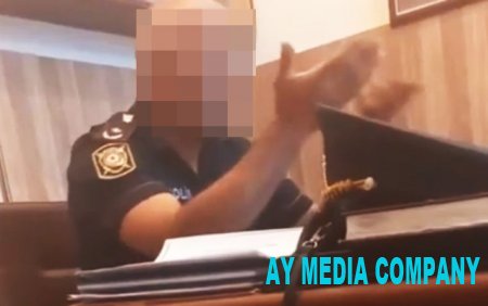 Satıcını və polisi təhdid edən şəxs kimdir?